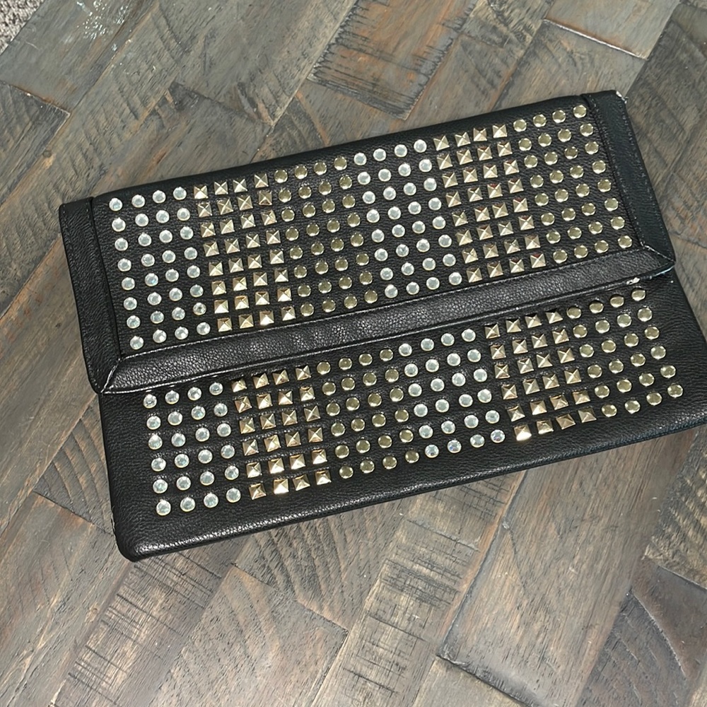 Black studded clutch